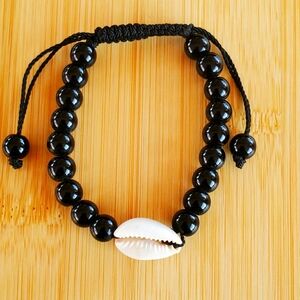 Handcrafed Beaded Cowrie Bracelet. Unisex